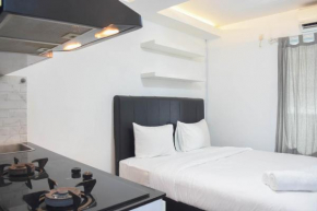Comfort and Homey Studio at Amethyst Apartment By Travelio
